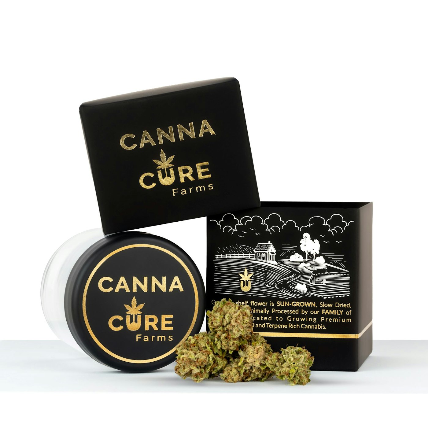 Canna Cure Farms flower — glass jar, gold-logo lid and black & gold box with a fresh bud